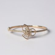 Golden Toned Floral Cluster Round AD Studded Cuff Bracelet